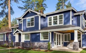 exterior of home with vibrant blue siding and energy-efficient windows